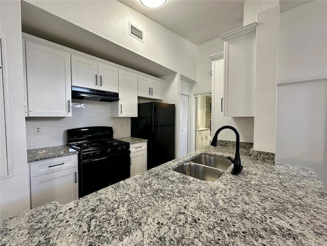 1606 Columbia Arms Cir, Unit 224 in Kissimmee, FL - Building Photo - Building Photo