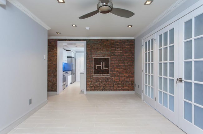 property at 221 E 11th St