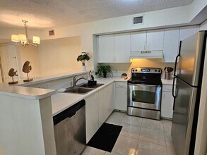 111 Yacht Club Way in Hypoluxo, FL - Building Photo - Building Photo
