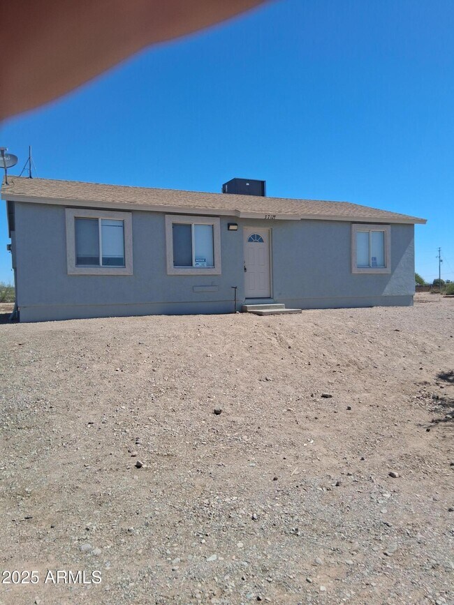 property at 37128 W Desert Bloom St