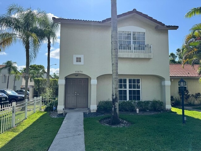 property at 10876 NW 8th St