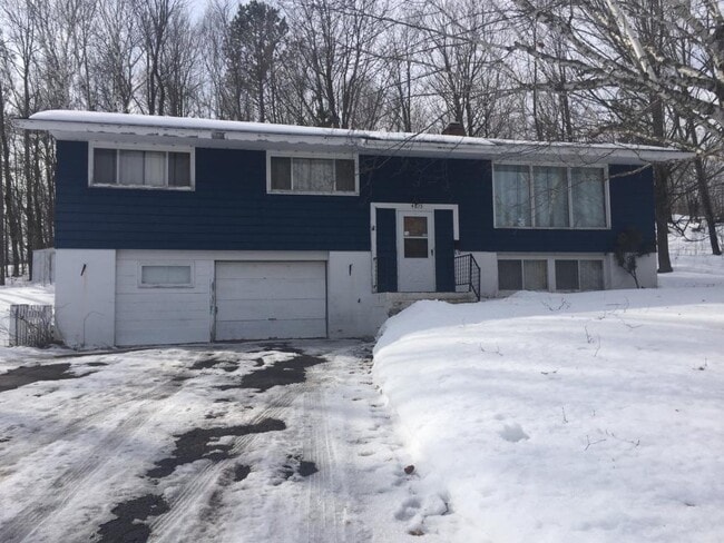 property at 4815 Woodland Ave