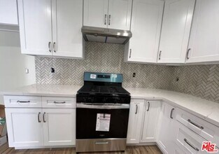 7929 Adoree St in Downey, CA - Building Photo - Building Photo