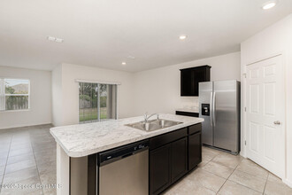 1299 Buffing Cir SE in Palm Bay, FL - Building Photo - Building Photo