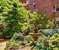 76-10 34th Ave in Queens, NY - Building Photo