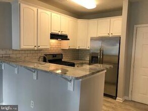 15620 Everglade Ln-Unit -203 in Bowie, MD - Building Photo - Building Photo