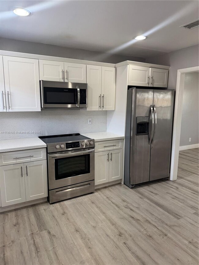 124 SE 2nd Ave, Unit 1-2