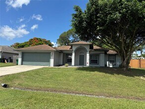3542 SW Margela St in Port St. Lucie, FL - Building Photo - Building Photo
