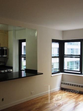 property at 412 E 55th St