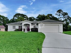 6117 NW Gause Ave in Port St. Lucie, FL - Building Photo