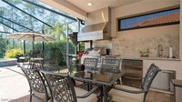 7711 Martino Cir in Naples, FL - Building Photo - Building Photo