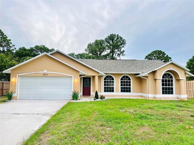 property at 2853 SW East Louise Cir