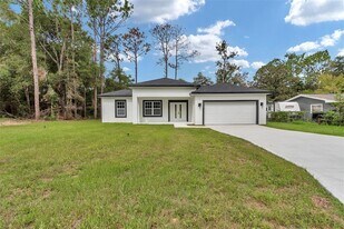 7911 N Pocono Dr in Citrus Springs, FL - Building Photo