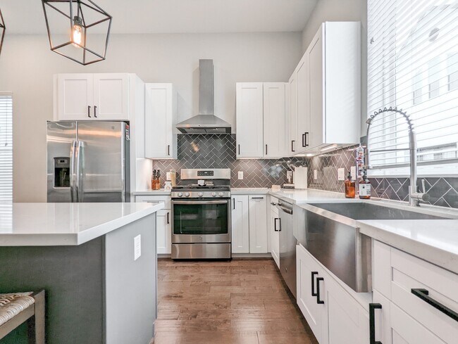 property at 1114 W 15th 1/2 St