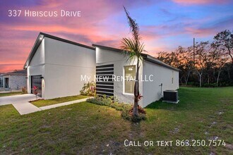 337 Hibiscus Dr in Poinciana, FL - Foto de edificio - Building Photo
