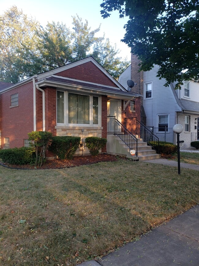 property at 9101 S Paxton Ave