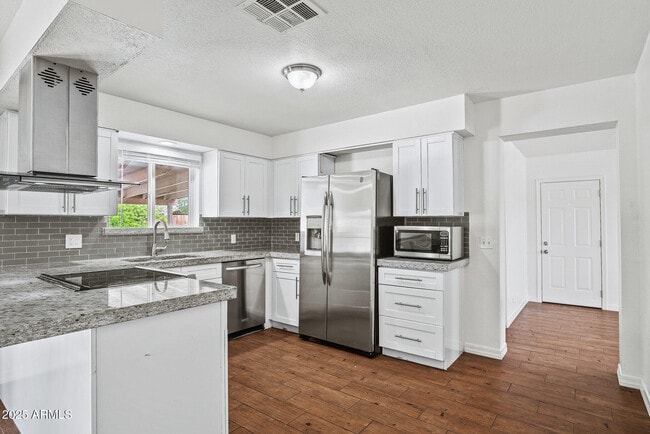 property at 720 E Broadway Ln