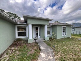 1002 SW Romaine Ln in Port St. Lucie, FL - Building Photo