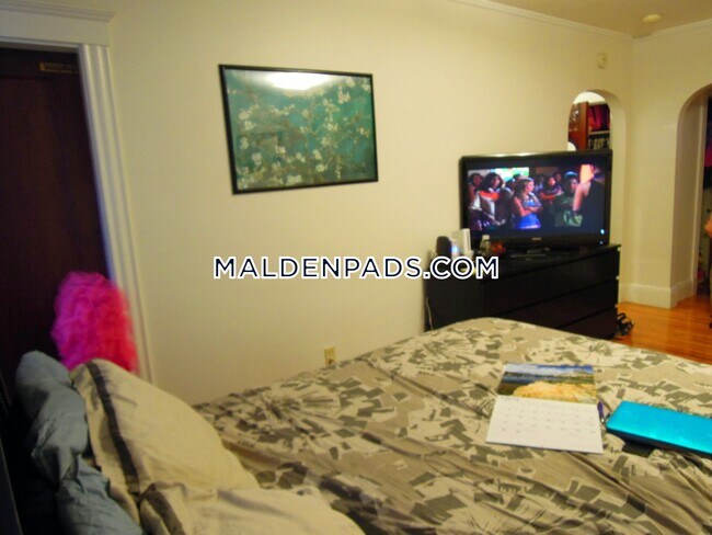 349 Pleasant St, Unit A1-19 in Malden, MA - Building Photo - Building Photo
