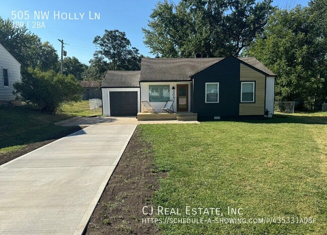 property at 505 NW Holly Ln