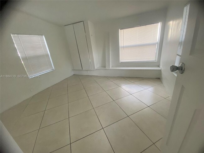 property at 4557 NW 3rd St