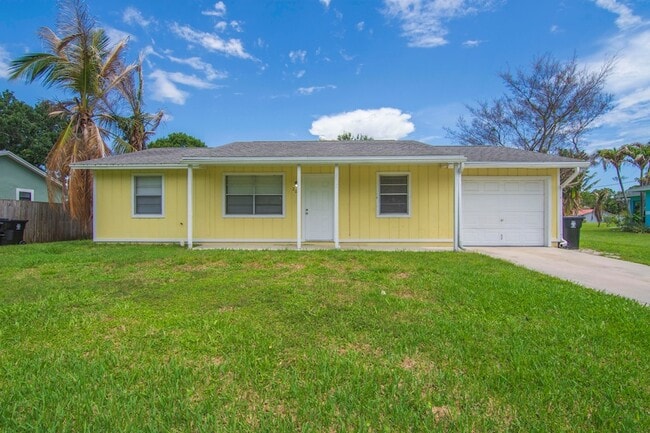 property at 205 SW Voltair Terrace