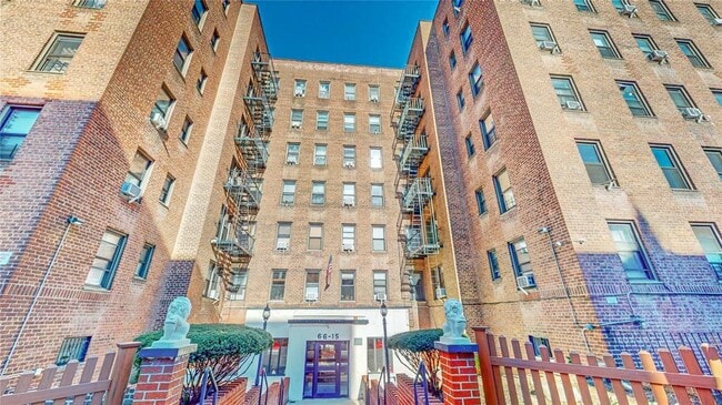 property at 66-15 Wetherole St