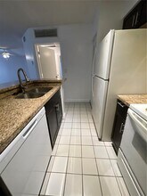 2881 N Oakland Forest Dr, Unit 208 in Oakland Park, FL - Building Photo - Building Photo