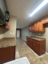216 NW 15th St, Unit 216 in Belle Glade, FL - Foto de edificio - Building Photo