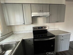 51049 Eisenhower Dr, Unit 4 in La Quinta, CA - Building Photo - Building Photo