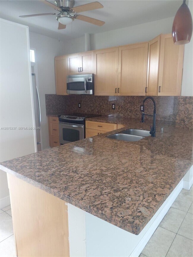 property at 5495 NW 10th Ct