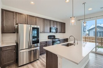 9735 Uravan St in Commerce City, CO - Building Photo - Building Photo