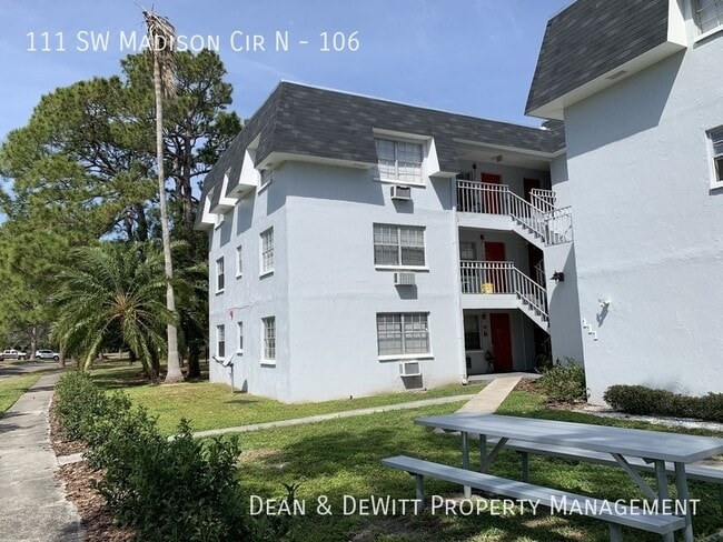 property at 111 SW Madison Cir N