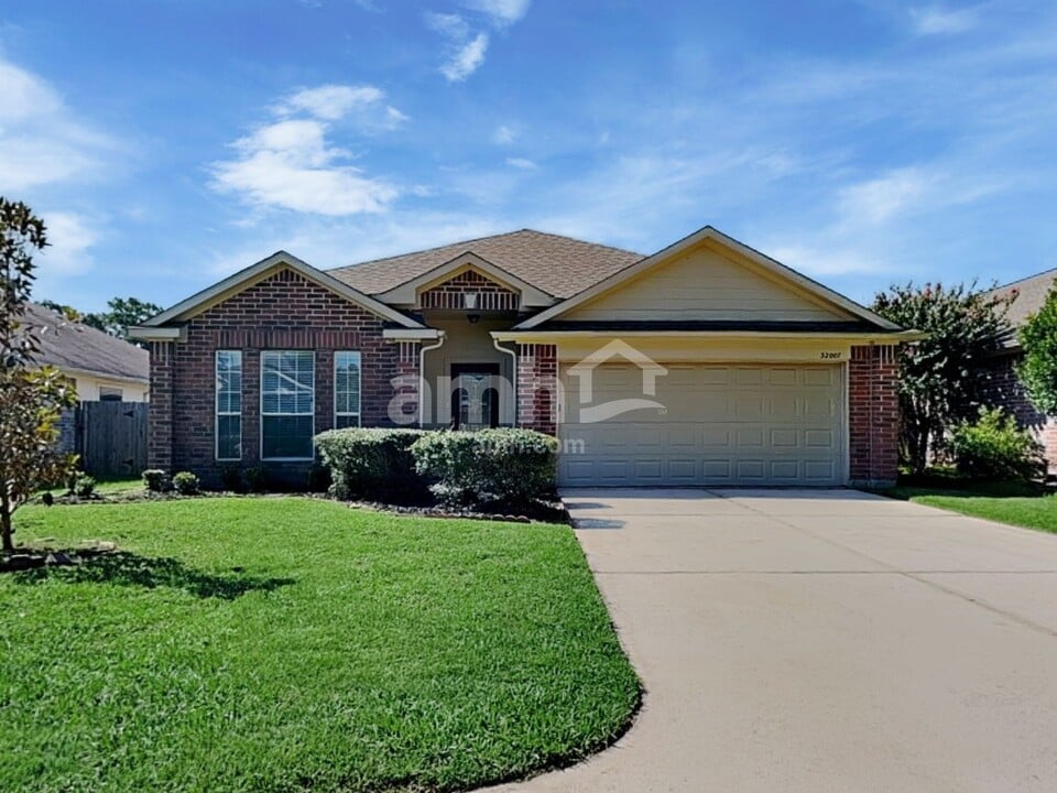 32007 Annice Ln in Pinehurst, TX - Building Photo