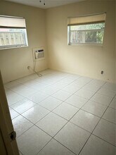 1477 NW 12th Ave in Sunrise, FL - Building Photo - Building Photo