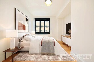 Stunning, Elegant, 2 Bedroom Right off Lorimer L train, Amazing Roof deck, Gym, Great Location! in Brooklyn, NY - Building Photo - Building Photo