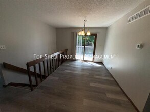 9041 Carpenter Cir Dr in Clive, IA - Building Photo - Building Photo