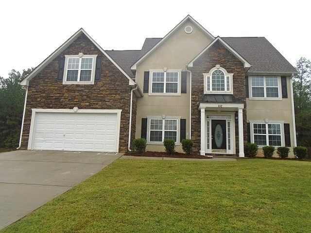 332 Sunderland Way in Stockbridge, GA - Building Photo