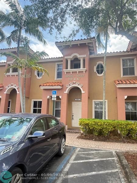 property at 10561 SW 6th St