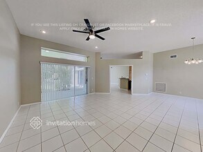 1053 Wild Cherry Ln in Wellington, FL - Building Photo - Building Photo