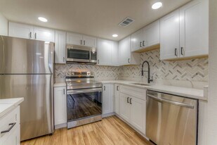 The Garden District Apartments formerly We...