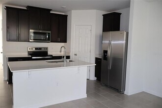 16310 Bird of Paradise Ave in Clermont, FL - Building Photo - Building Photo