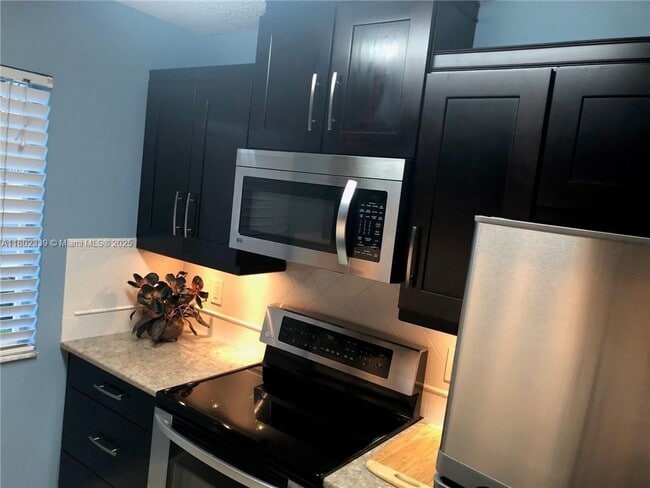 10717 Cleary Blvd, Unit 202 in Plantation, FL - Building Photo - Building Photo