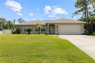 1290 Mendavia Terrace in North Port, FL - Building Photo