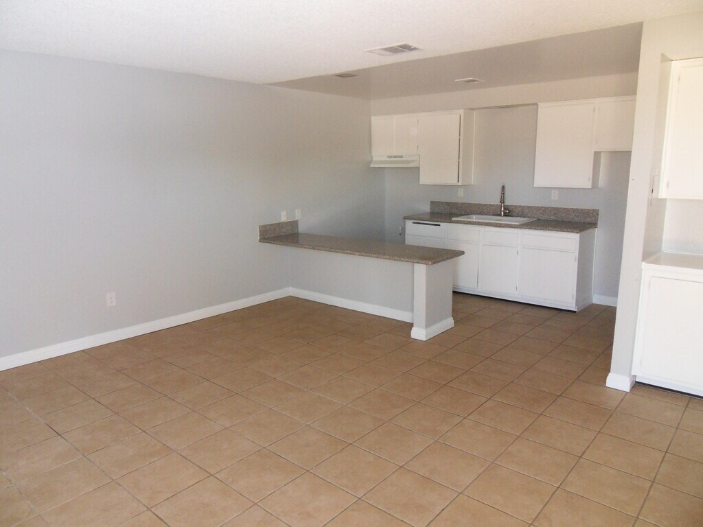 12037 White Ave Apartments in Adelanto, CA