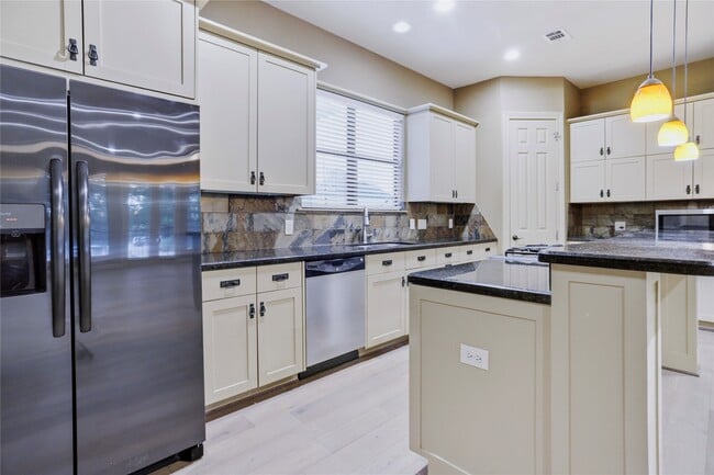 property at 1603 W 14th St