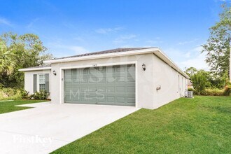 1549 SW Fresno Rd in Port St. Lucie, FL - Building Photo - Building Photo