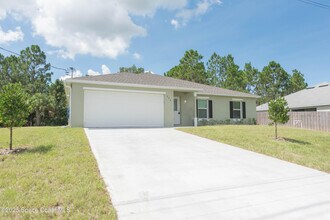390 J T Sancho St SW in Palm Bay, FL - Building Photo - Building Photo
