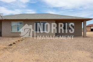 9874 W Leander Dr in Arizona City, AZ - Building Photo
