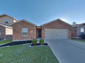 32608 Decker Creek Dr in Pinehurst, TX - Building Photo